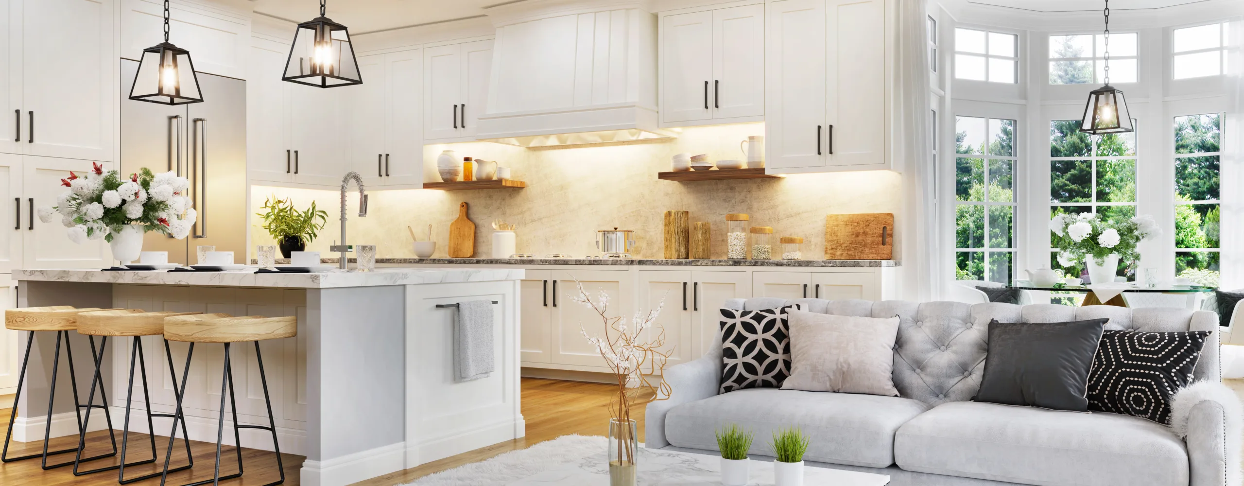 Luxurious interior design of white kitchen, dining room with windows and living room in one space<br />
